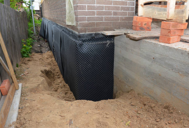 SJ Waterproofing Pros technician performing targeted Waterproofing assessment in Middleburg, PA